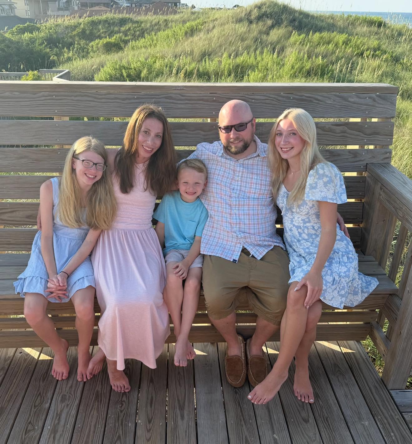 Coach Scott with his family at the beach